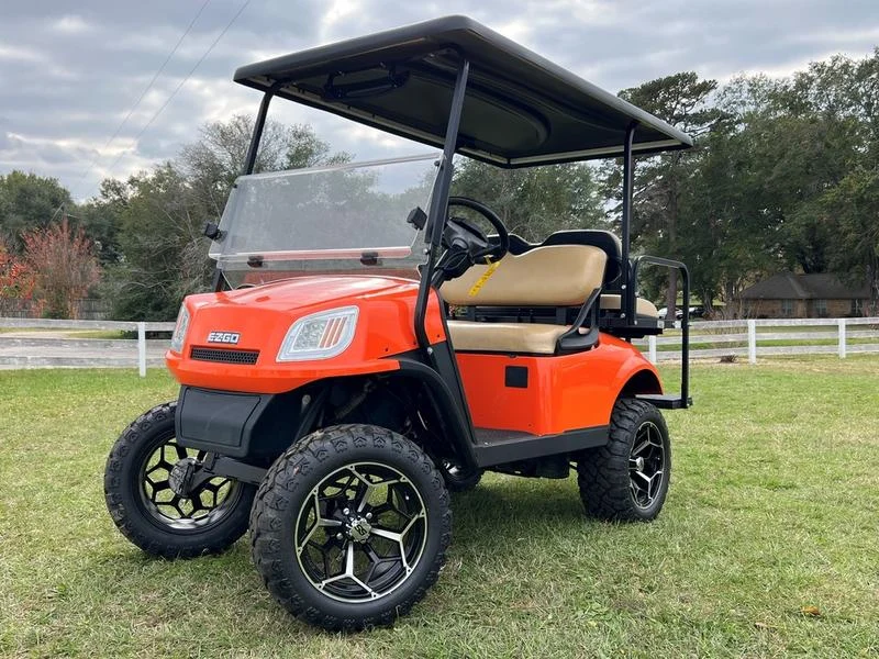 2020 E Z GO TXT 2+2 EFI Gas Orange for Sale (1)